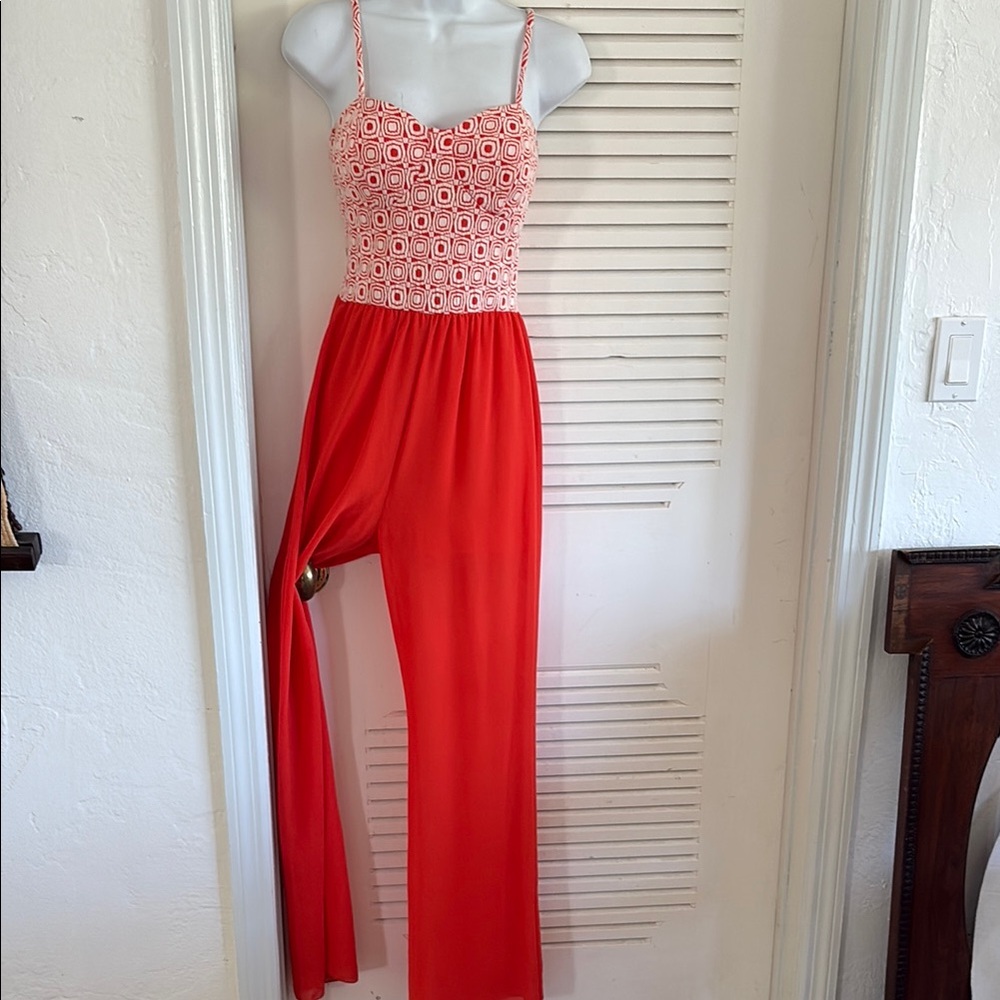 Vibrant Orange Geometric Patterned Jumpsuit with Flowing Pants
